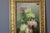 Oil on canvas depicting fruit and a bouquet of dahlias, exhibition label top right and signed bottom right C. Moll,...