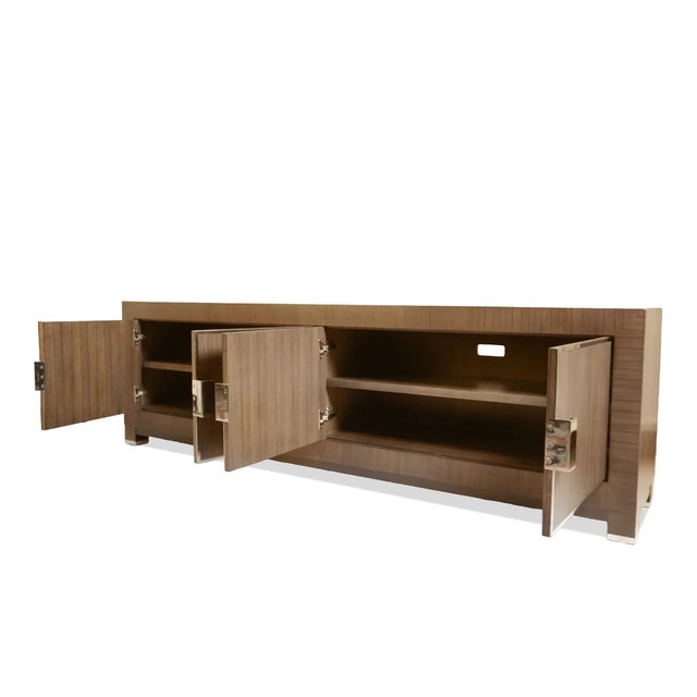 The Maxim 4-Door Media Console from Restoration Hardware offers a bold yet refined storage solution, perfect for modern...