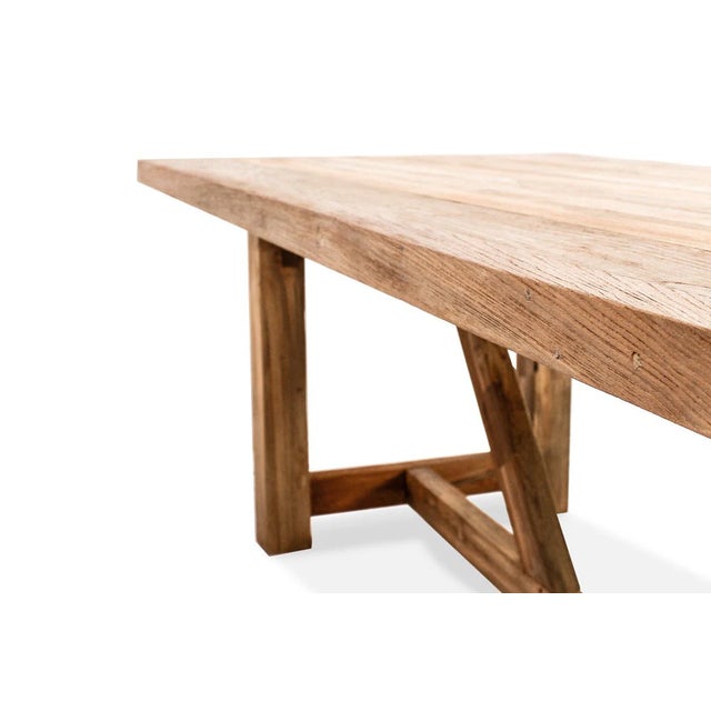 Large dining table from reclaimed teak suitable for outdoor areas, Vinegard allows the authentic nature of the timber to...