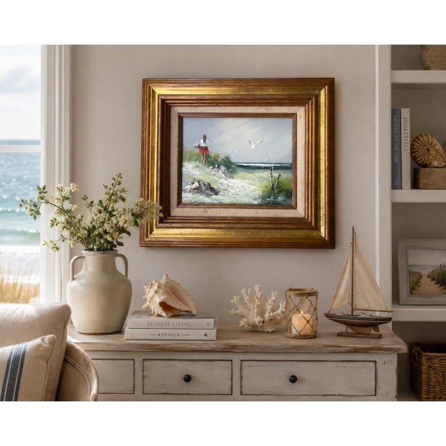 Bring timeless coastal charm to your home with this original vintage oil painting signed J. Fenton. The composition...