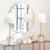 Refined and elegant, the Ribbon Lamp is composed of a tall gold leafed neck and molded metal ribbon atop a cylindrical,...