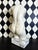 A substantial signed 1955 female torso sculpture attributed to Alva Studios, carved from marble and stone. Standing...