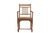 This Vintage Anglo-Indian Teakwood Armchair is handcrafted from solid teakwood, featuring a comfortably angled slatted...