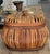 Mid century rattan box, oval shape. Carved filigreed band. Top knob.