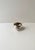A sterling silver salt cellar vessel and sterling silver spoon with Lion head and paw feet detail, in the Empire style,...