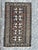 "Discover the timeless beauty of this exquisite antique Shirwan Caucasian rug. This masterpiece features a captivating...