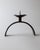 This vintage hand forged iron candle holder from the 1960s is a striking example of sculptural Mid Century metalwork....