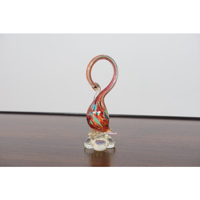 Beautiful multi-colored swan sculpture made of Italian Murano art glass. The sculpture is signed. The swan figurine has...