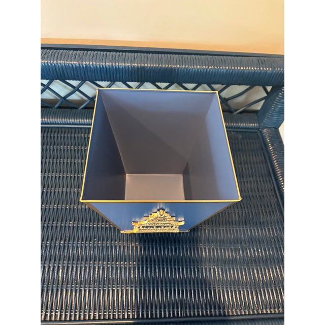 Offered is a metal painted Cachepot by Jays Studio. This piece features a beautiful blue color with gold colored accents...