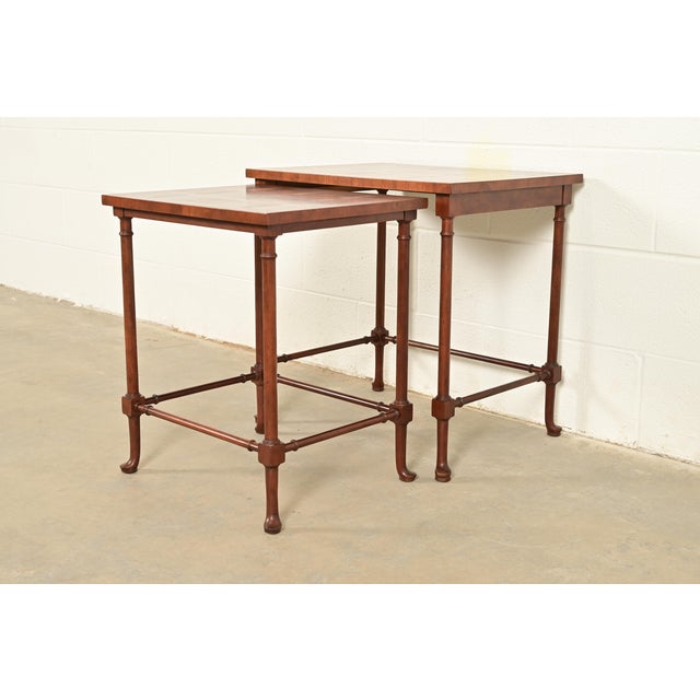 A gorgeous set of two English Regency, Georgian, or Queen Anne style nesting side tables By Baker Furniture USA, Circa...