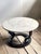 Distinctive Swedish postmodern coffee table dating from the 1980s, featuring a sculptural black base and a circular...