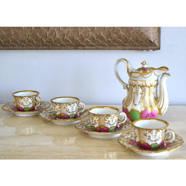 Set of 9 Piece Tea Set Very good vintage condition. Cups measure: Height: 2.25 inches x 4 inches x 3.25 inches diameter....