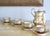 Set of 9 Piece Tea Set Very good vintage condition. Cups measure: Height: 2.25 inches x 4 inches x 3.25 inches diameter....