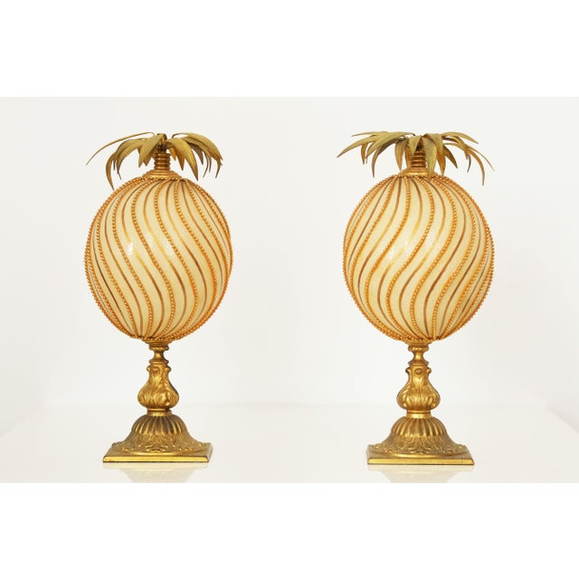A striking pair of sculptural decorative ostrich eggs attributed to the French artist François Dupuy. Each ostrich egg is...