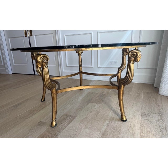 This extraordinary cocktail table by Marge Carson is a masterclass in Hollywood Regency glamour, offering a scale and...