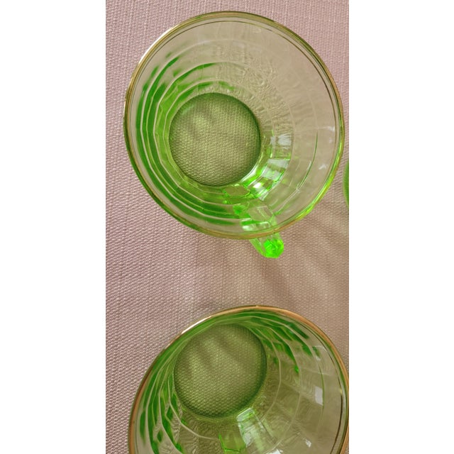 Early 20th Century Uranium Glass 4 Transparent Green Tea Cups With Gold Rim For Sale - Image 13 of 16