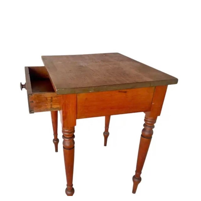 Sheraton Style Cherry Side Table. Table features a warm cherry wood finish and a single dovetailed drawer fitted with a...