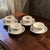 A set of four vintage Spode Copeland England tea cups and saucers with a beautiful floral pattern called Felicity. The...