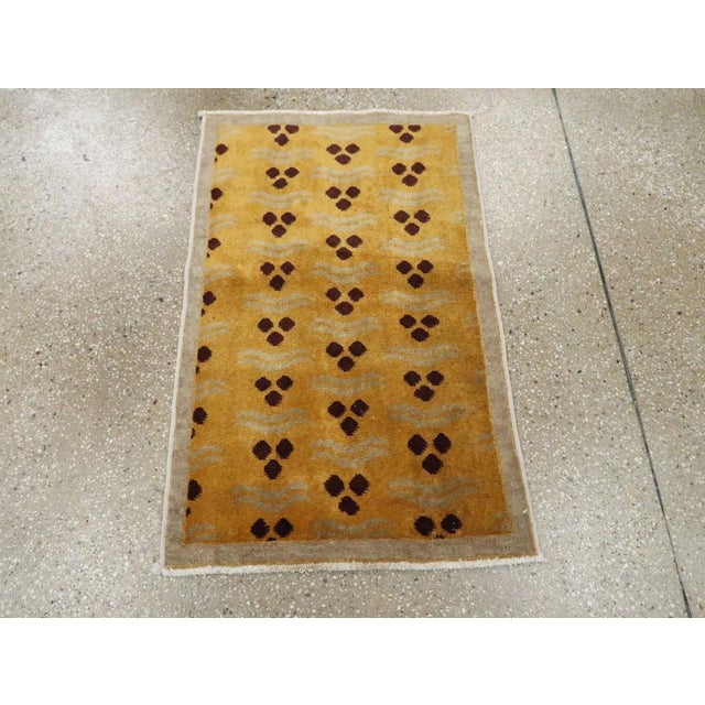 A vintage Turkish Anatolian Deco throw rug handmade during the Mid-20th century. Measures: 2' 0" x 3' 2"