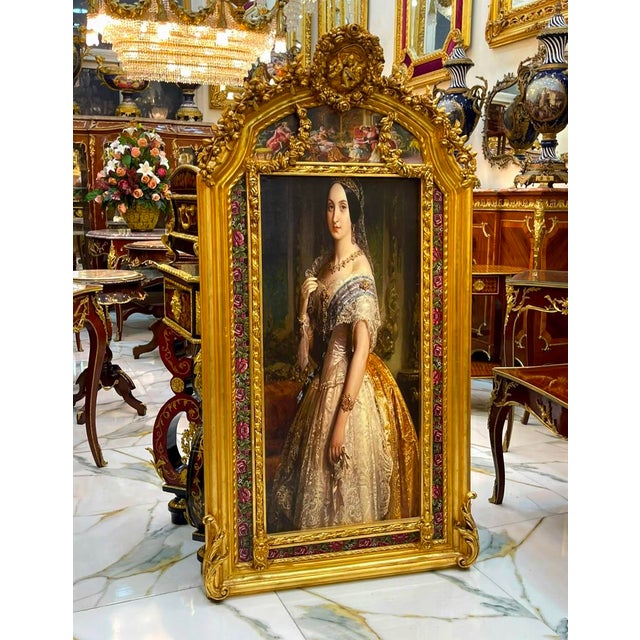 Make a striking statement with this exquisite French Baroque–style portrait artwork, beautifully presented in an elaborate...