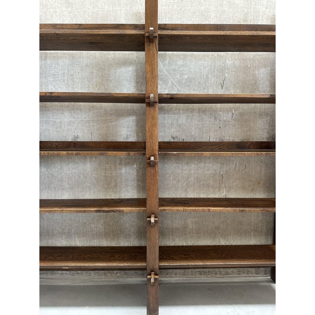 Meet this striking vintage wabi-sabi brutalist solid oak wall cabinet. This monumental piece combines raw, organic warmth...