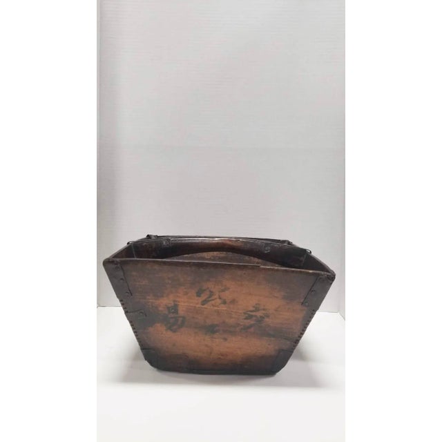 Hailing from the culturally vibrant Shanxi Province of China, this stunning rice container is a true masterpiece crafted...