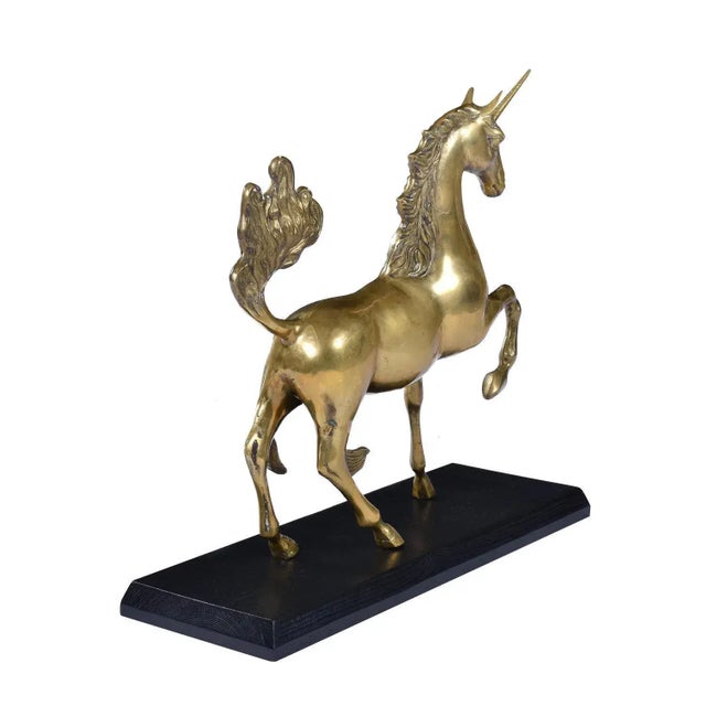 This large scale brass unicorn sculpture stands at 21.75" tall with it's base! The figure itself is 20" tall. The majesty...