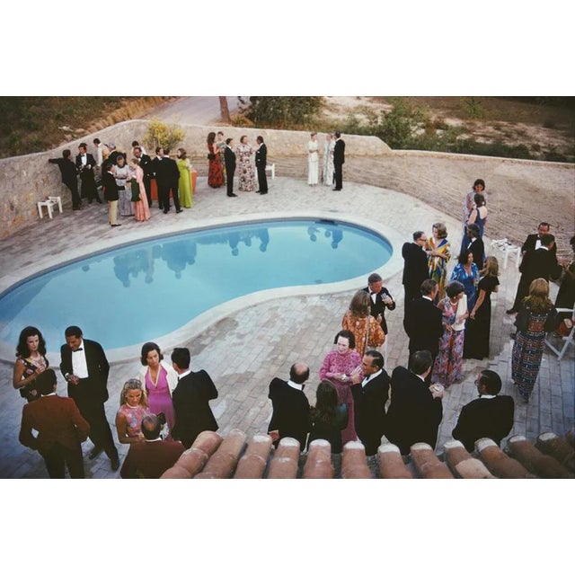 Black Tie Poolside 1973 by Slim Aarons Slim Aarons Limited Estate Edition A formal party by a swimming pool in the...