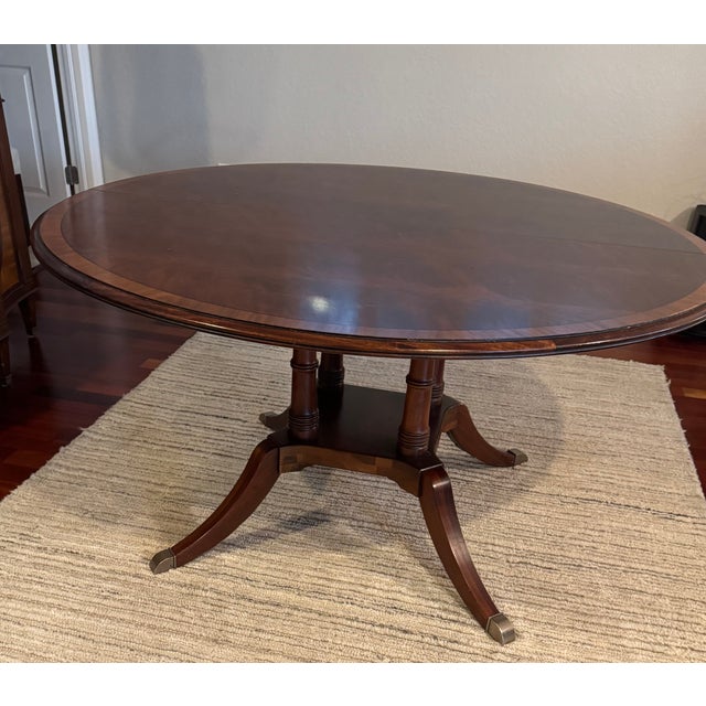 Ethan Allen 60” Round Dining Table (with leaf insert). Hand-Crafted Mahogany table. 30”height, 60” diameter. Very good...
