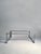 A post modern architectural coffee table by Leon Rosen for Pace. A heavy weight piece with solid bar construction....