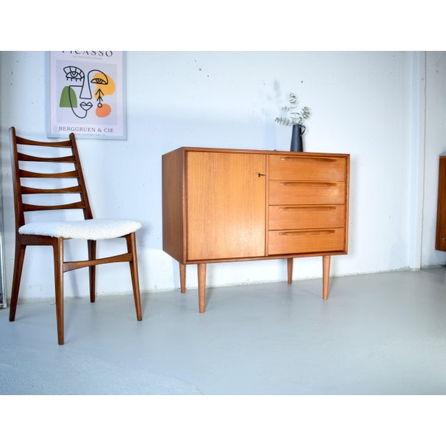 This is an RT piece of furniture from the 1960s by Heinrich Riestenpatt. Heinrich Riestenpatt was a German furniture...