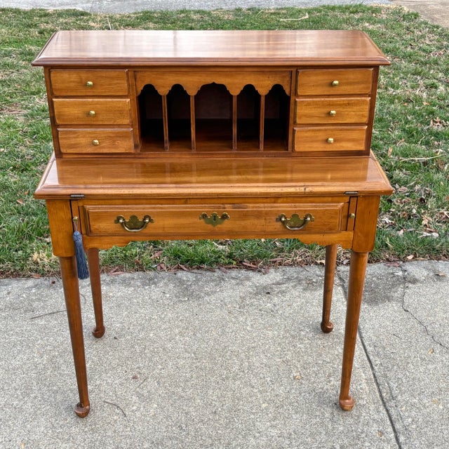 Vintage American maple flip-top secretary writing desk with bun feet, a charming 20th century reproduction of a colonial...
