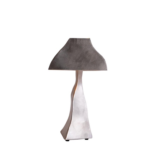 This Table lamp is designed to be a soft, warm and approachable piece of sculptural homeware. In Six Dot’s signature raw...