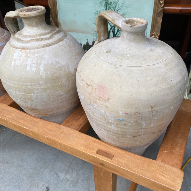 Nothing short of breathtaking and at a steal of a price. These beautiful old world olive jars would add class and culture...