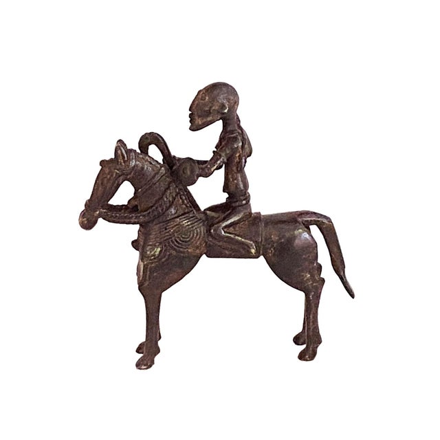 This exquisite African Dogon Bronze Horseman sculpture is handmade in Mali and cast in bronze. This piece measures 6.5" h...