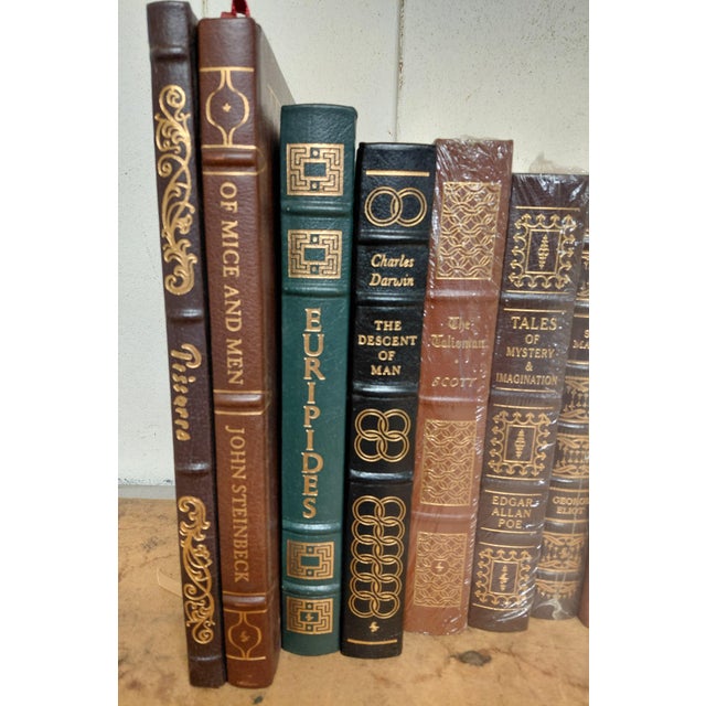 Easton Press Leather Bound Books Set of 10. 5 have collector plates, 3 are wrapped and unopened, one signed. Good...
