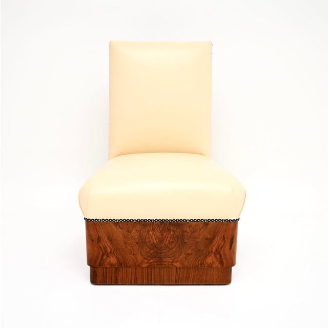 A fantastic Art Deco walnut and leather side chair / stool. This was made in England, it dates from the 1930’s. It is of...