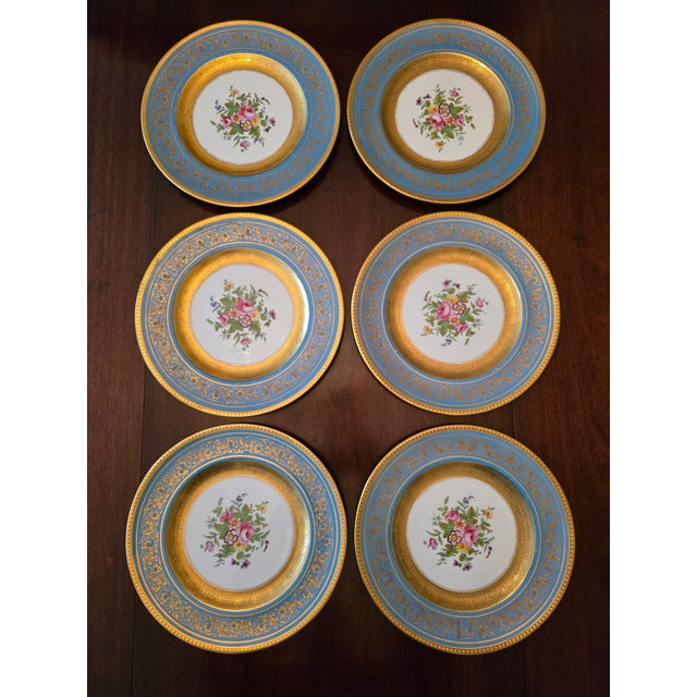 A magnificent set of six pre mid century modern era vintage English porcelain plates . Having handpainted flower bouquets...
