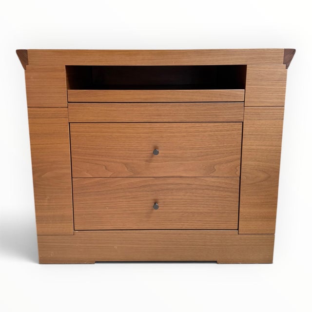 A pair of bedside tables designed by Chi Wing Lo (Hong Kong, b. 1954) for Italian furniture maker Giorgetti. Handmade in...