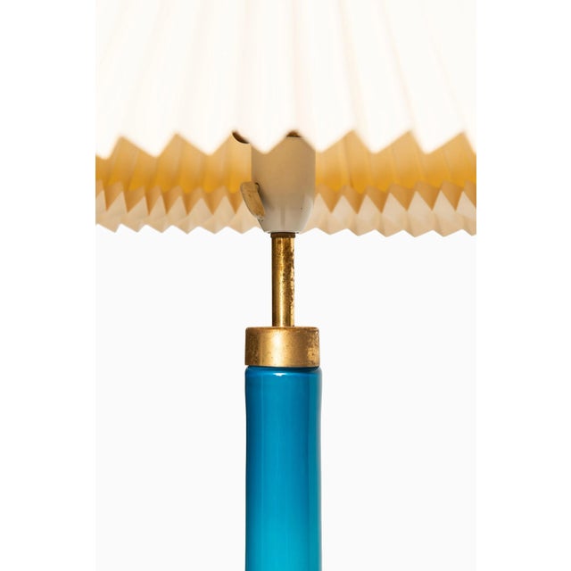 Rare pair of tall table lamps designed by Svend Aage Holm Sørensen. Produced by Holm Sørensen & Co. in Denmark. Please...