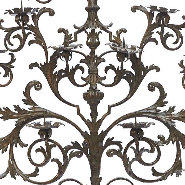 Large Wrought Iron Candle Holder Wall Light, 1700, with 15 flames arranged on an elegant pyramid-shaped iron structure....