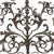 Large Wrought Iron Candle Holder Wall Light, 1700, with 15 flames arranged on an elegant pyramid-shaped iron structure....