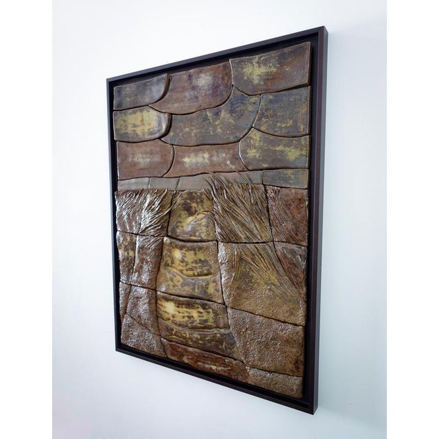 Patina ii ceramic mural by audrey vo van dimensions: d 7 x w 59 x h 78 cm materials: brown clay (stoneware) - handbuilt -...