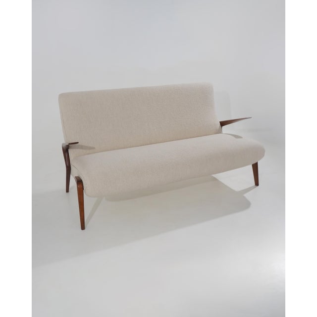 A d71 sofa designed by osvaldo borsani for tecno in the 1950s, a project in which the generous upholstered volume is...