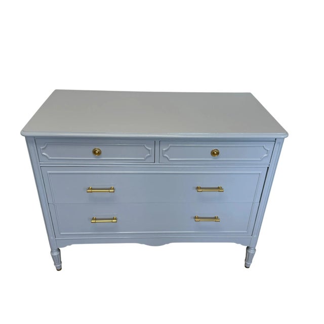 From the esteemed workshop of Sligh Furniture in Grand Rapids, Michigan (circa 1927-1932), comes this transformed...