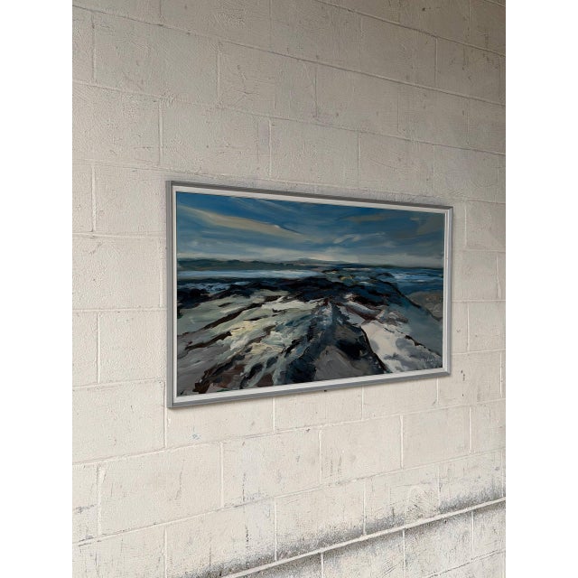 This panoramic landscape painting captures a sweeping coastal view with rocky shores under a dramatic sky. The expressive...