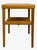 This vintage mid century modern end table features a clean, functional design with subtle sculptural details. The...