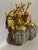 A striking pair of late 20th-century French Louis XVI-style gilt bronze wall sconces, designed with sculptural deer head...