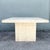 Pedestal: 26”w, 13.25”d, 28.25”h A striking vintage Italian dining table crafted in richly textured natural travertine....