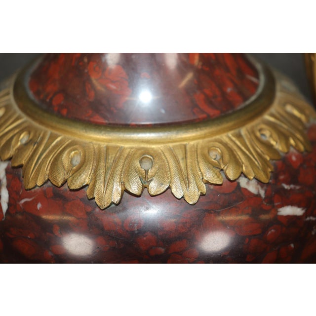 This superb rouge marble urn form occasional table showcases the perfect marriage of classical design and luxurious...